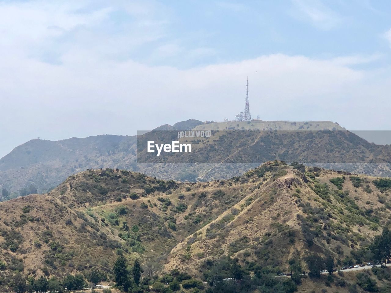 Scenic view of landscape and mountains against sky