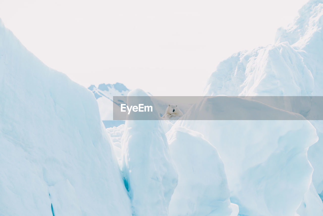 scenic view of snowcapped mountains against clear sky