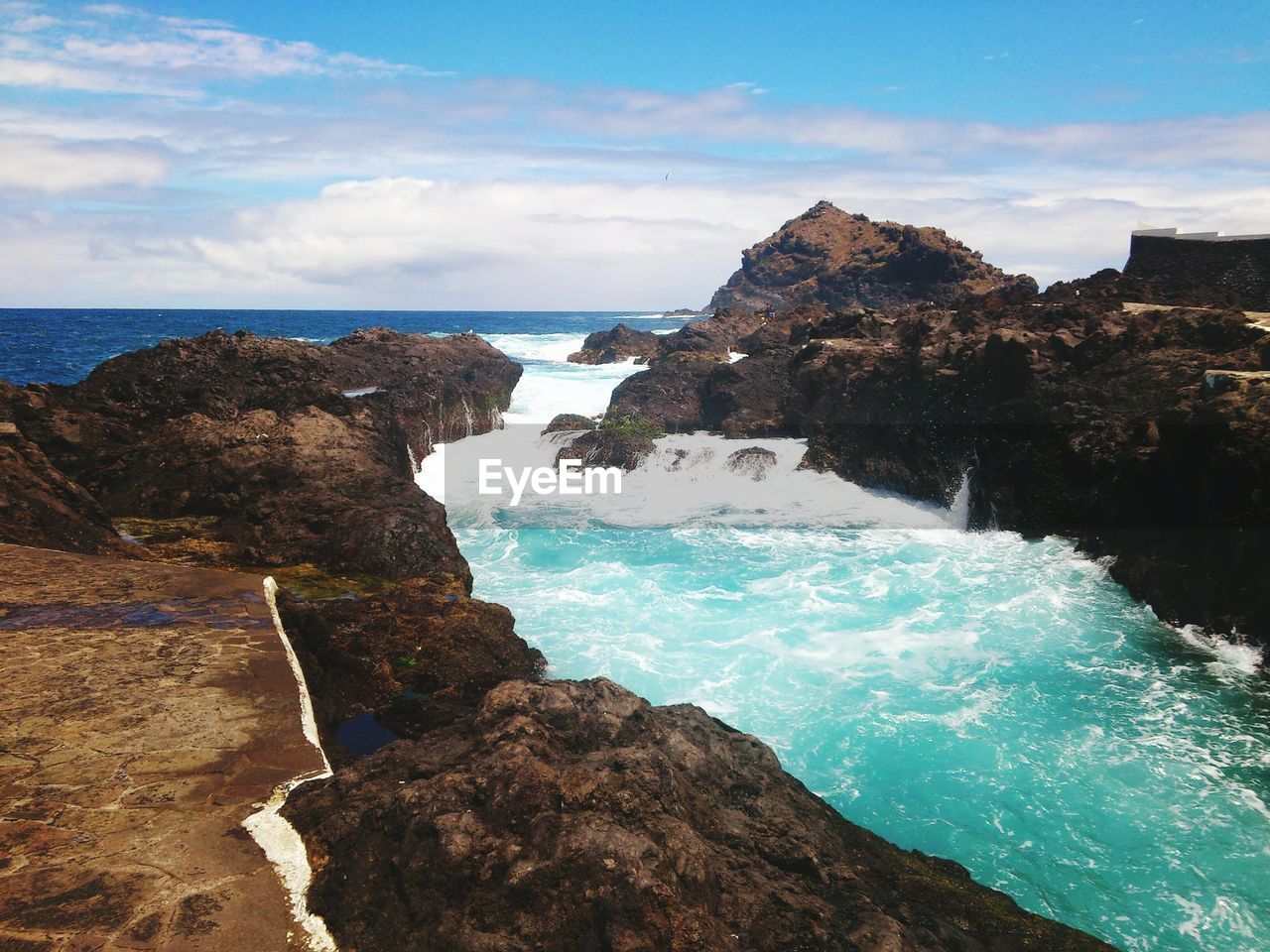 Scenic view of sea against clear sky