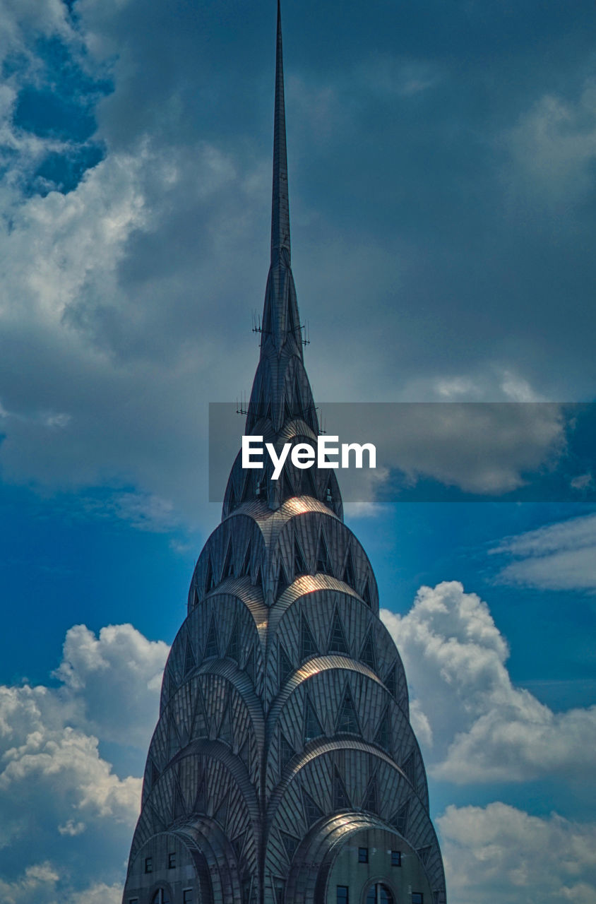 LOW ANGLE VIEW OF TEMPLE BUILDING AGAINST SKY