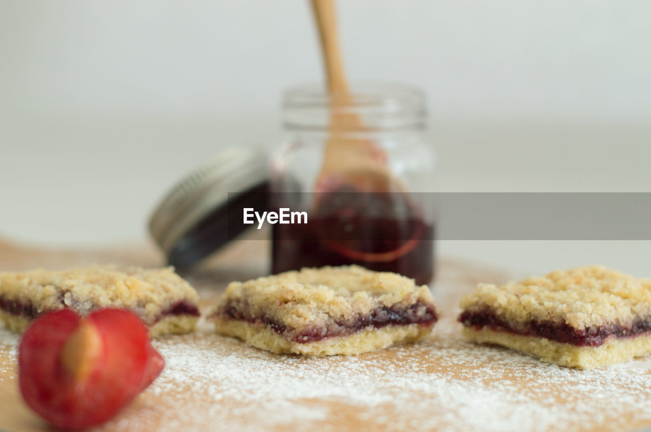 CLOSE-UP OF COOKIES ON TABLE