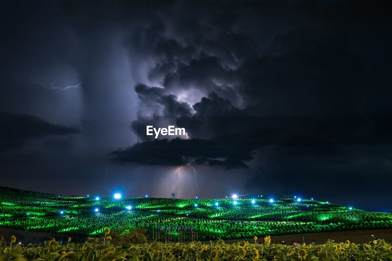 Scenic view of stormy clouds against sky at night