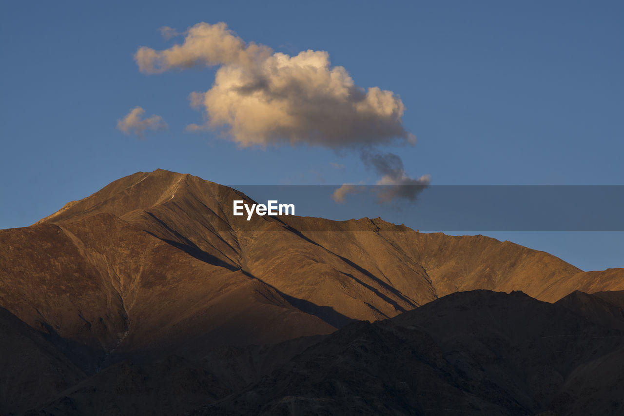 Low angle view of mountain against sky