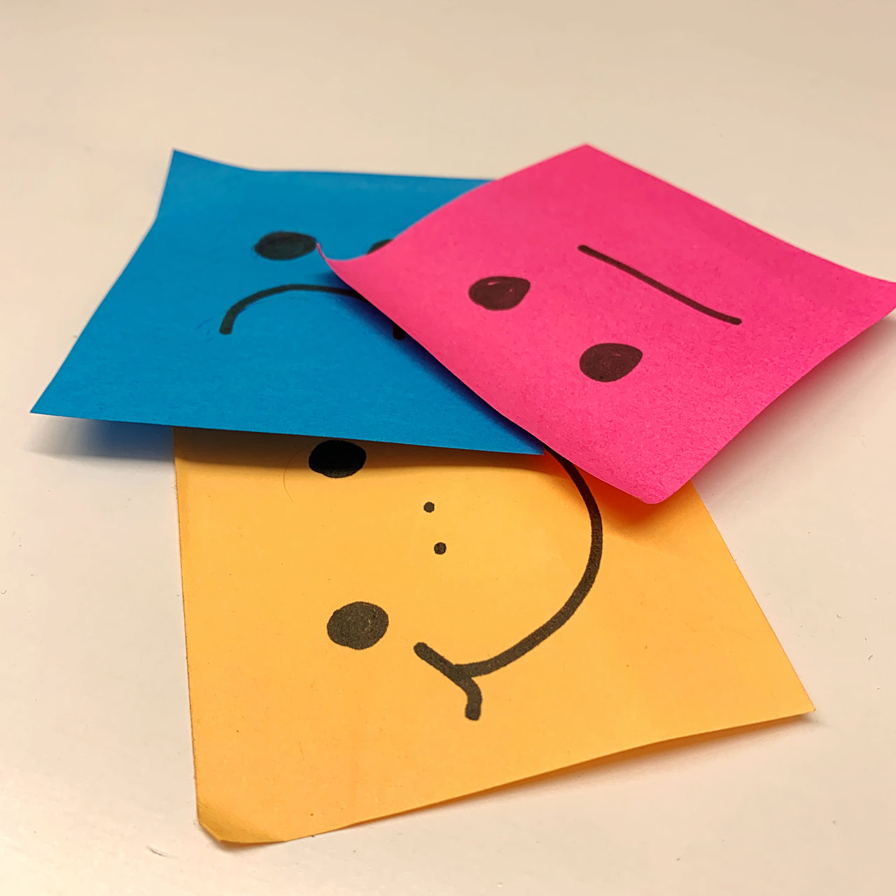 Close-up of colorful papers on table