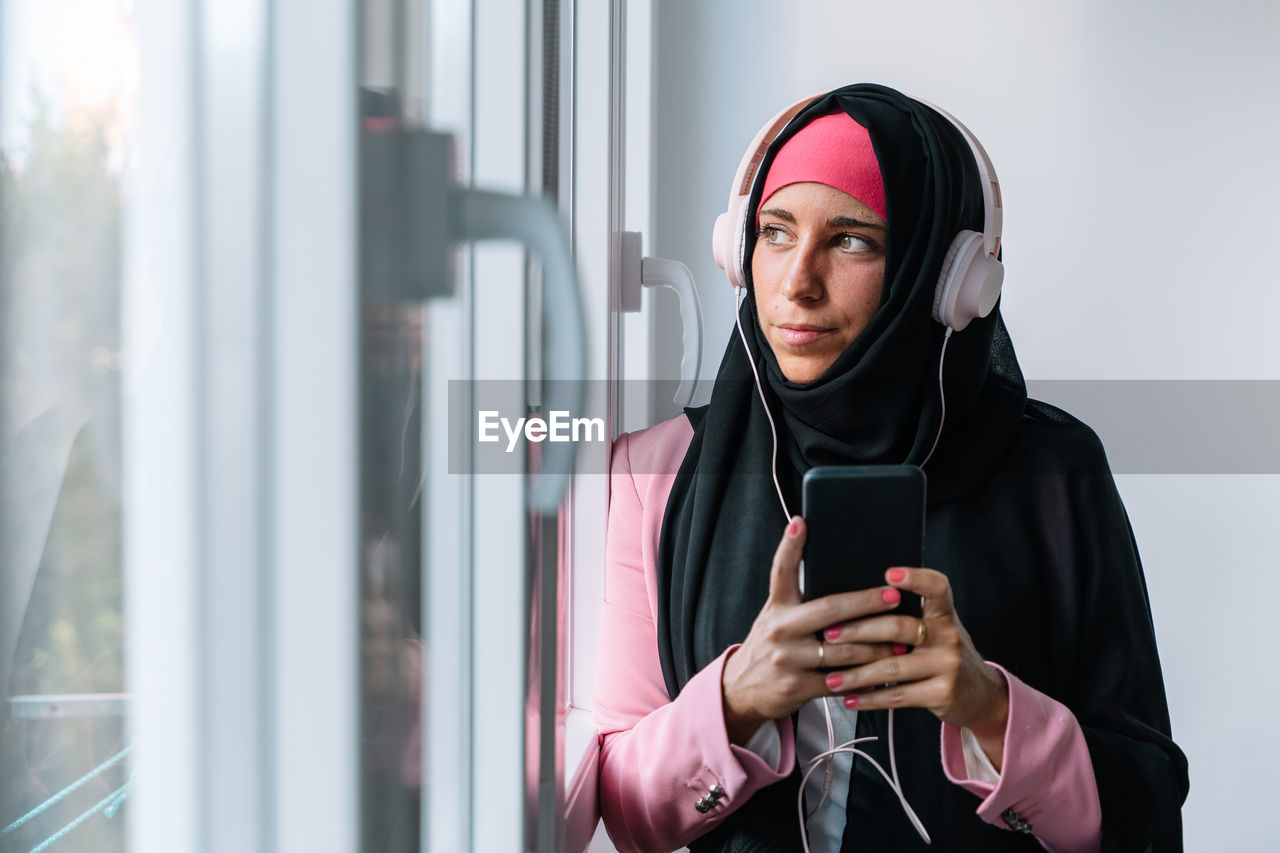 Young woman using mobile phone