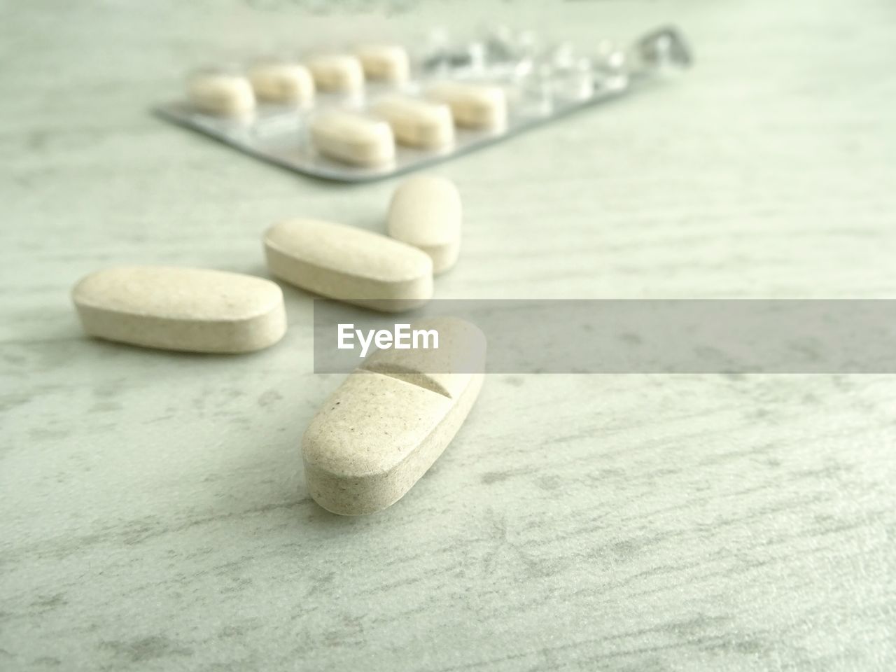 Close-up of medicine on table