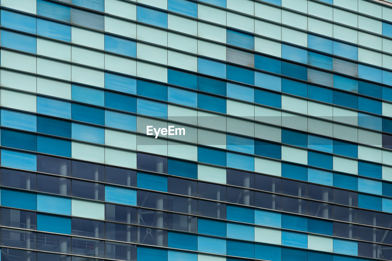 low angle view of modern buildings against sky