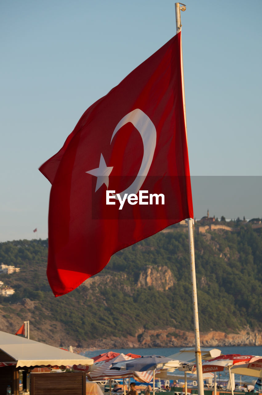 Turkish flag against river