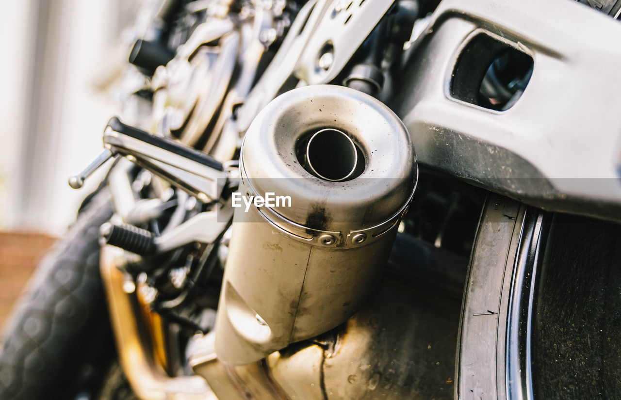 Close-up of exhaust pipe on motorcycle