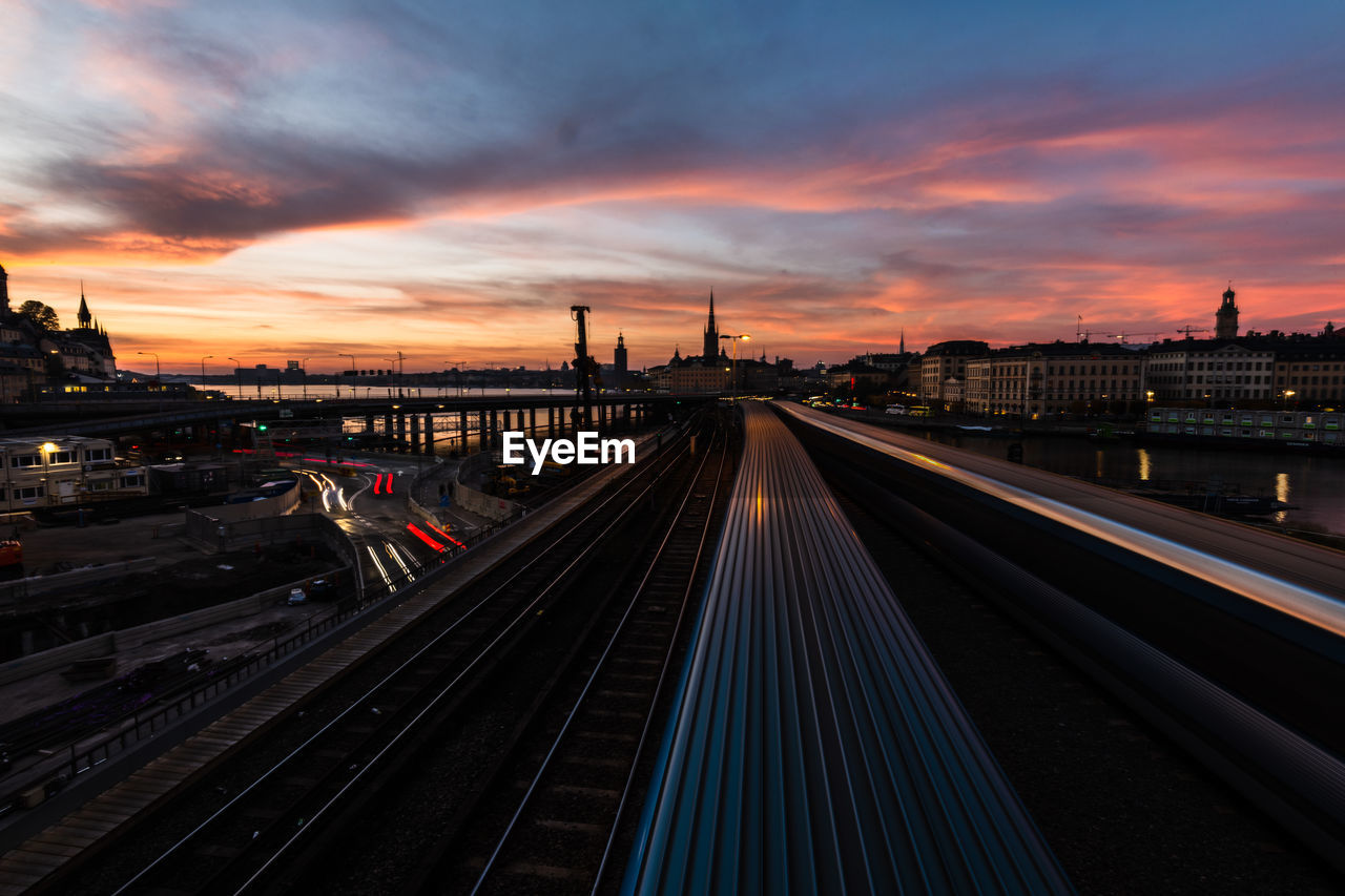 High angle view of railroad tracks at sunset