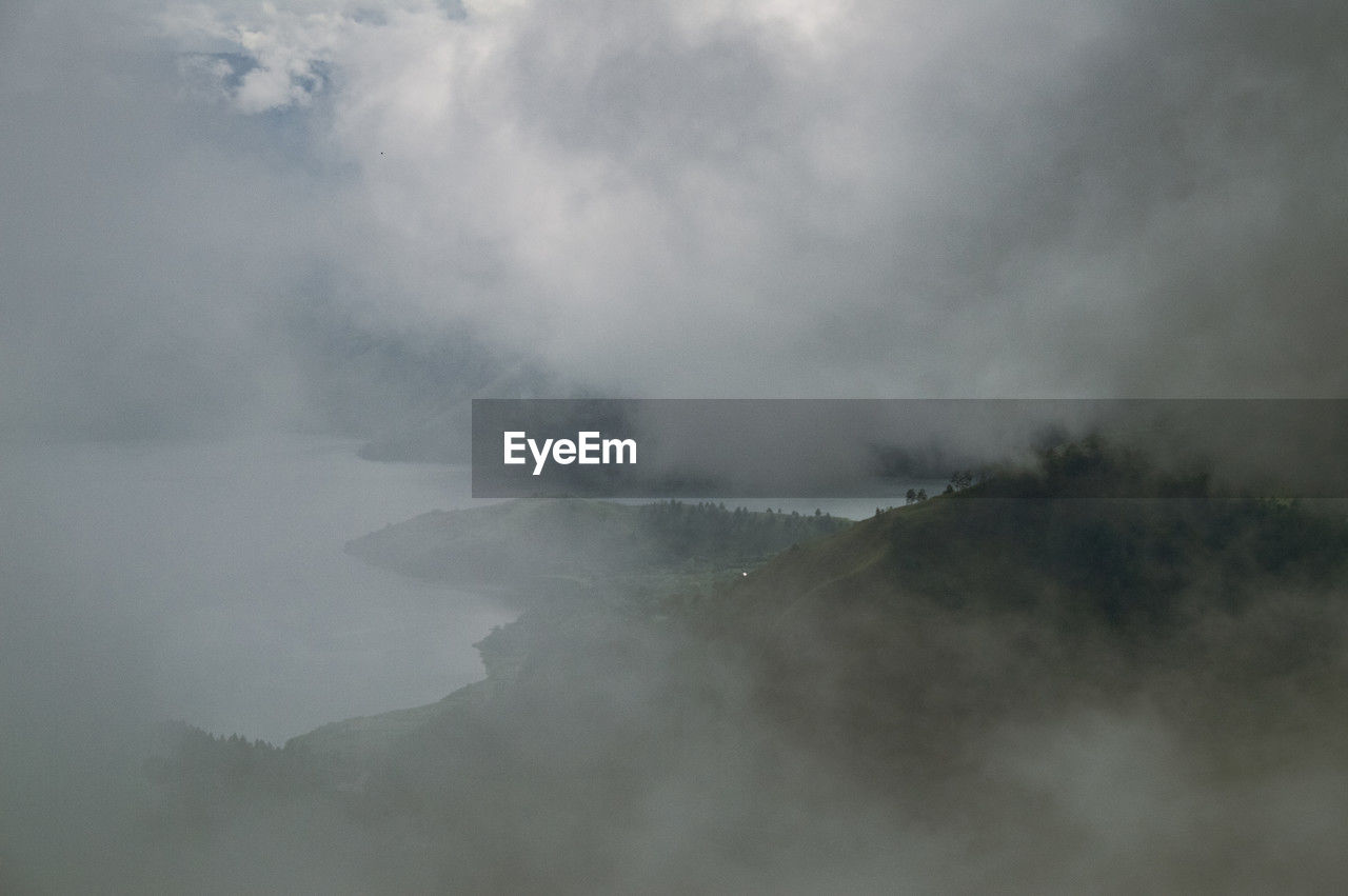 mist, fog, cloud, environment, mountain, beauty in nature, scenics - nature, landscape, nature, sky, no people, land, morning, tranquility, tree, outdoors, non-urban scene, travel, plant, day, forest, tranquil scene, travel destinations, mountain range, water, snow