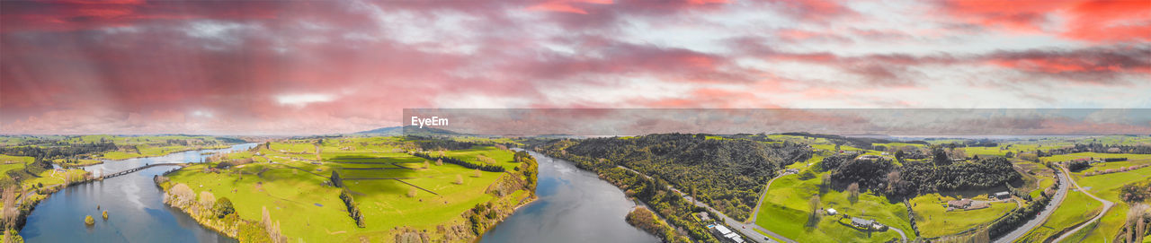 PANORAMIC VIEW OF LAND AND MOUNTAIN AGAINST SKY