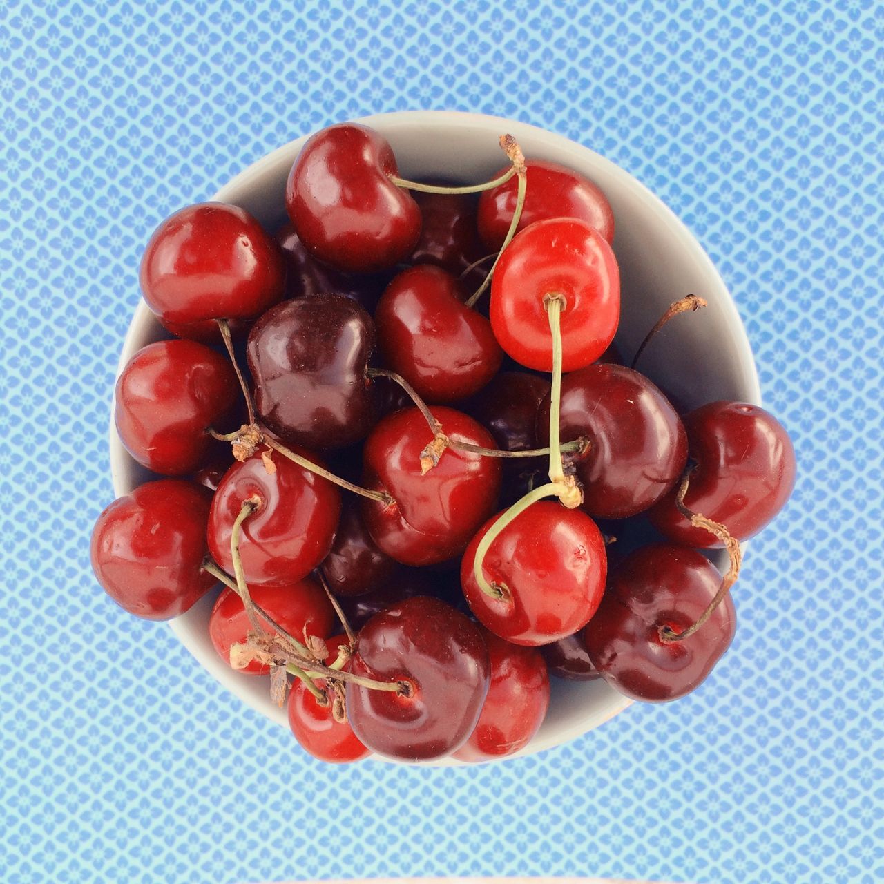 Close-up high angle view of cherries in bowl