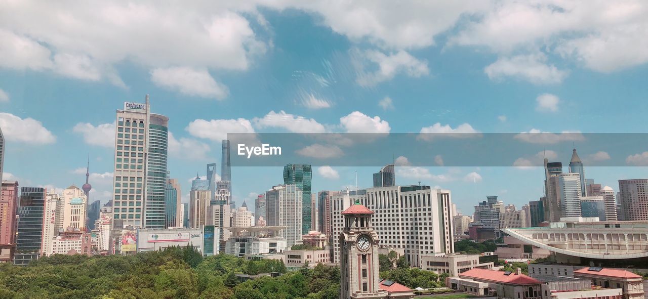 PANORAMIC VIEW OF BUILDINGS AGAINST SKY