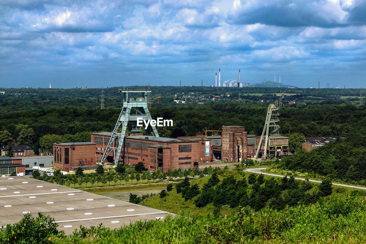 High angle view of coal mine against sky