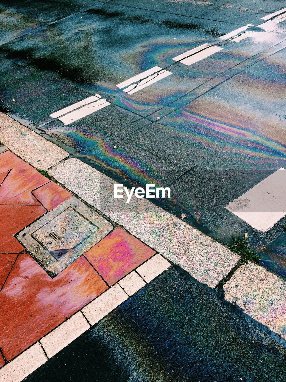 High angle view of oil spill on street