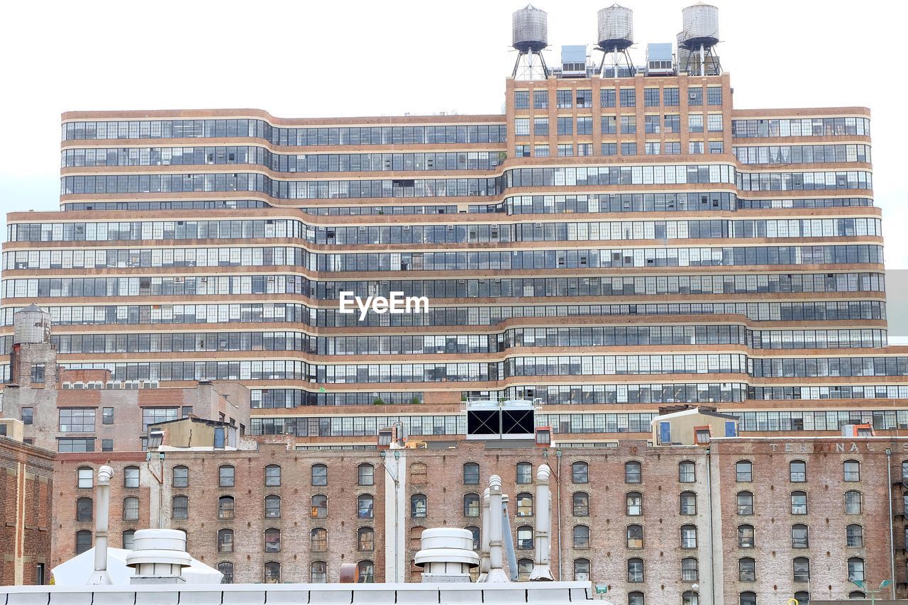 Buildings against clear sky