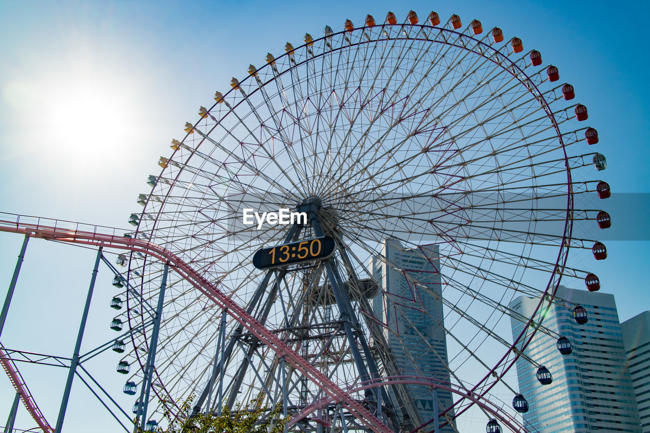 FERRIS WHEEL AGAINST CLEAR SKY