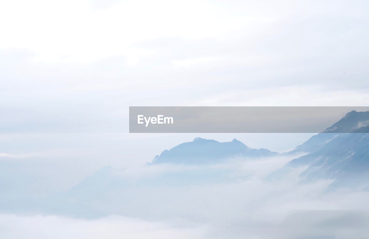 MAJESTIC MOUNTAINS AGAINST SKY