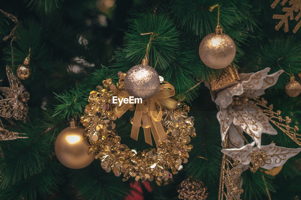 Close-up of christmas decoration hanging on tree