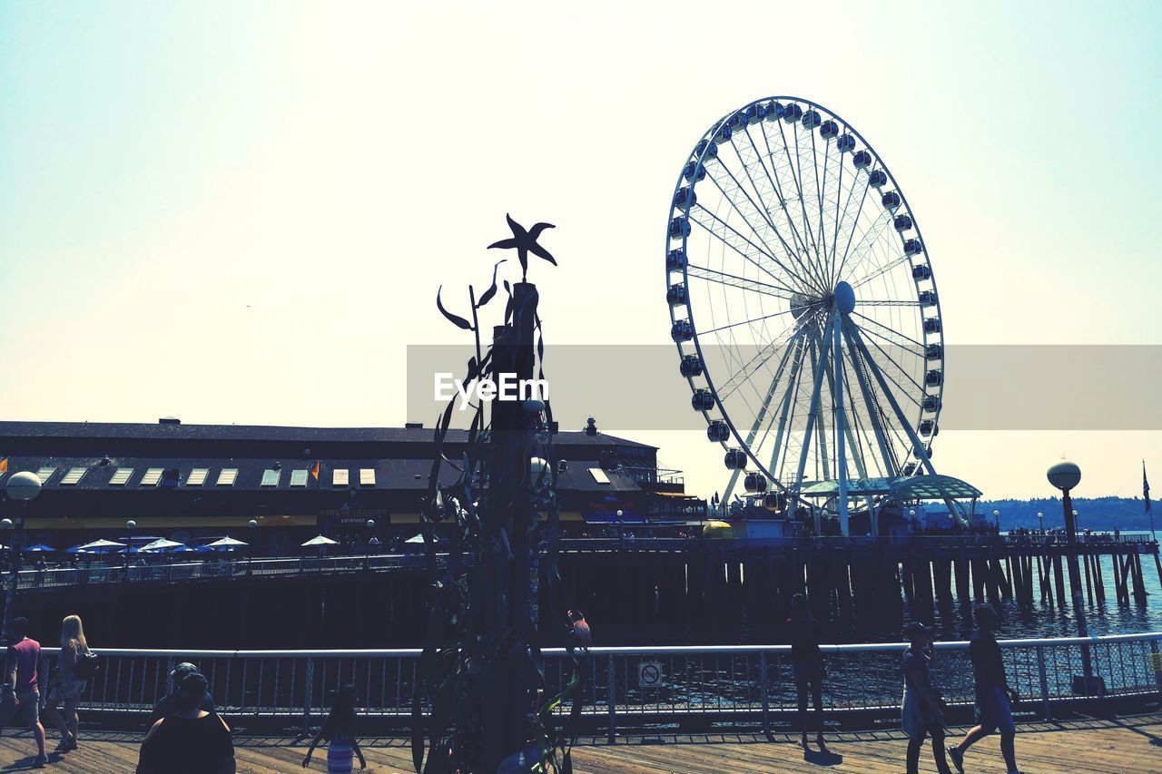 FERRIS WHEEL AGAINST SKY