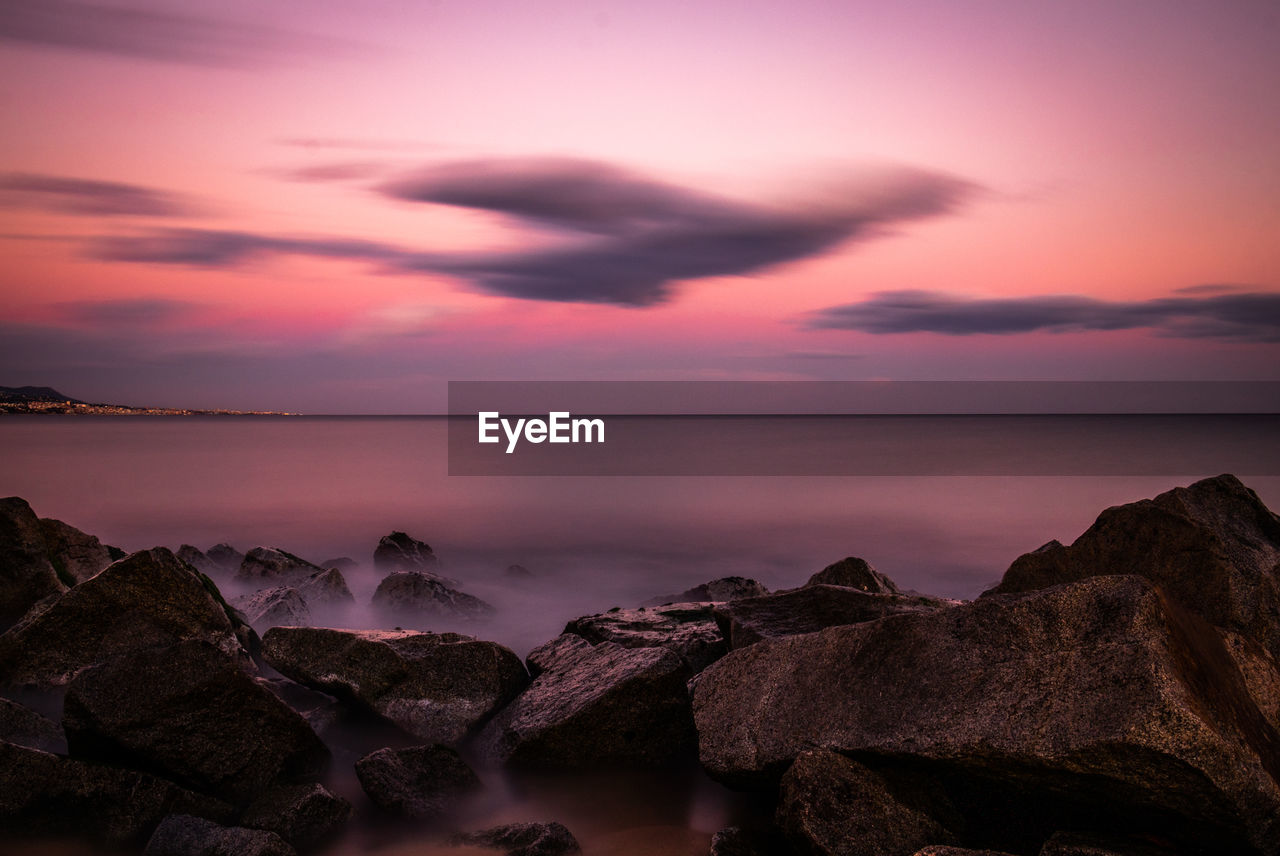 Scenic view of sea against sky during sunset