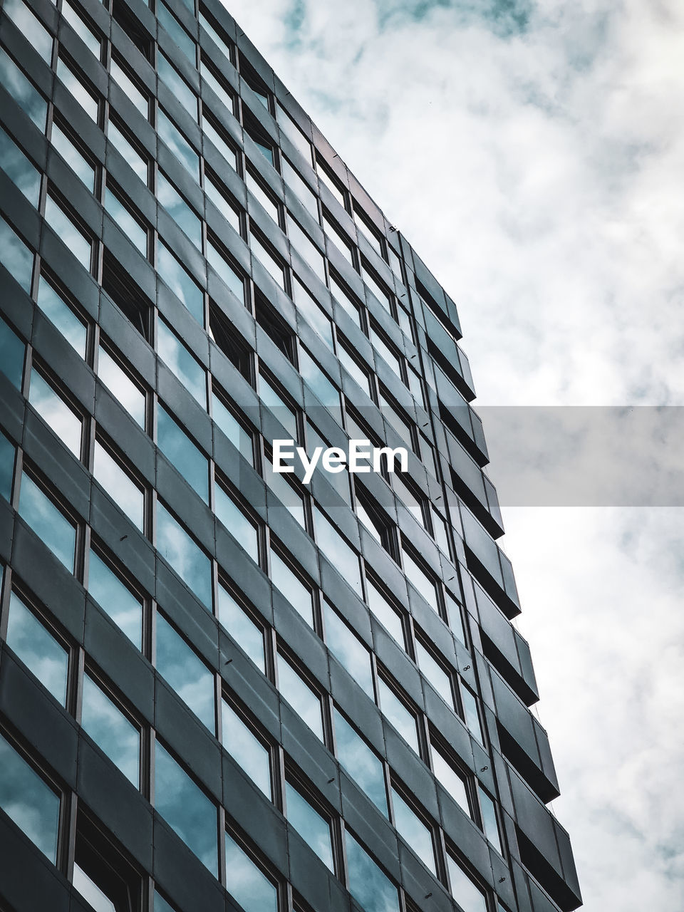 Low angle view of modern building against sky