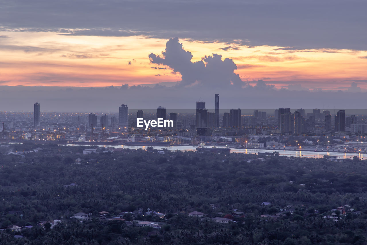 BUILDINGS IN CITY DURING SUNSET