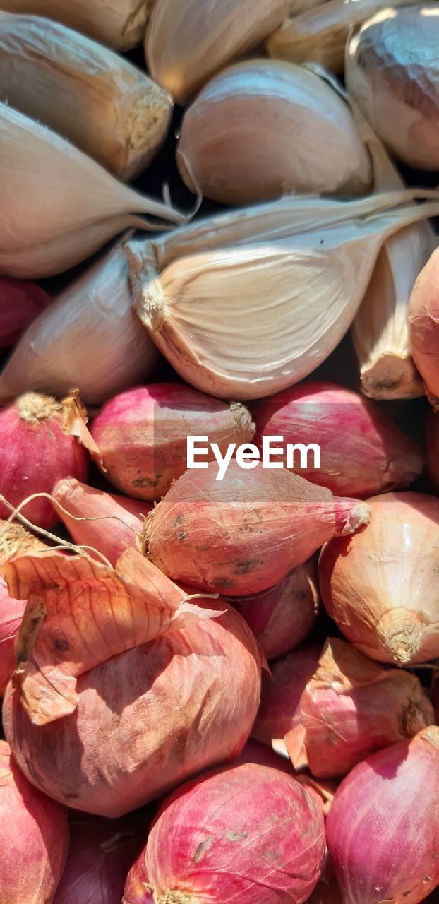 food and drink, food, shallot, freshness, healthy eating, produce, plant, large group of objects, full frame, wellbeing, no people, close-up, vegetable, abundance, backgrounds, still life, flower, market, petal, onion, raw food, high angle view, retail, day, pink, organic, for sale