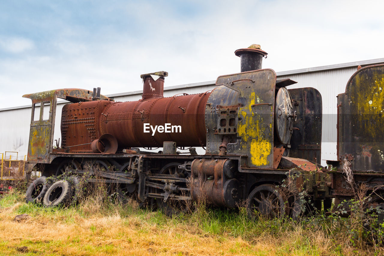 ABANDONED TRAIN ON RAILROAD TRACK