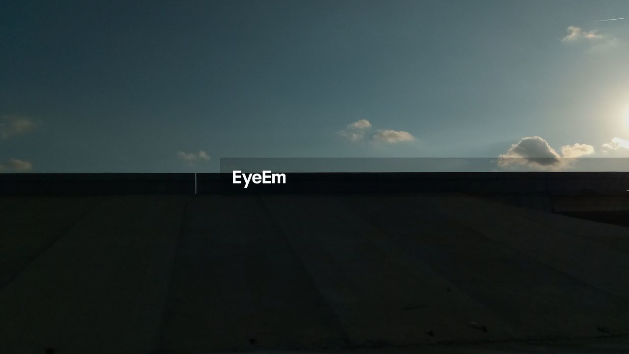 LOW ANGLE VIEW OF SKY OVER FIELD