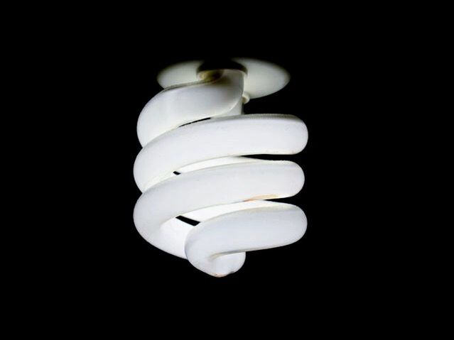 CLOSE-UP OF LIGHTING EQUIPMENT AGAINST WHITE BACKGROUND