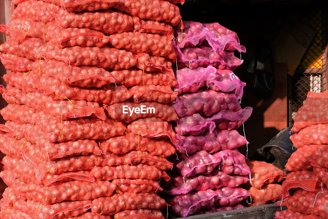 Stack of pink for sale in market