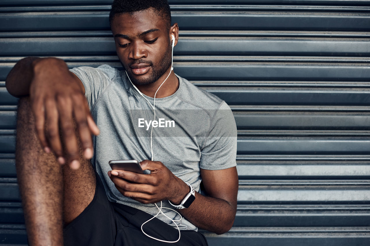 Young man using mobile phone