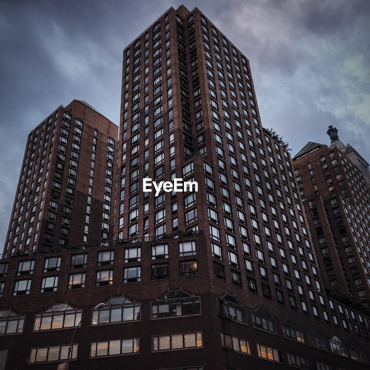 Low angle view of skyscrapers against sky