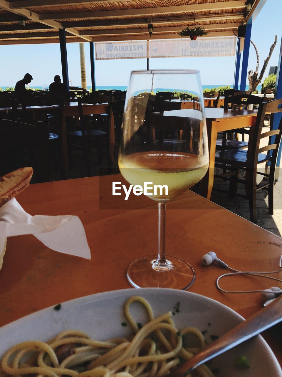 CLOSE-UP OF WINE ON TABLE