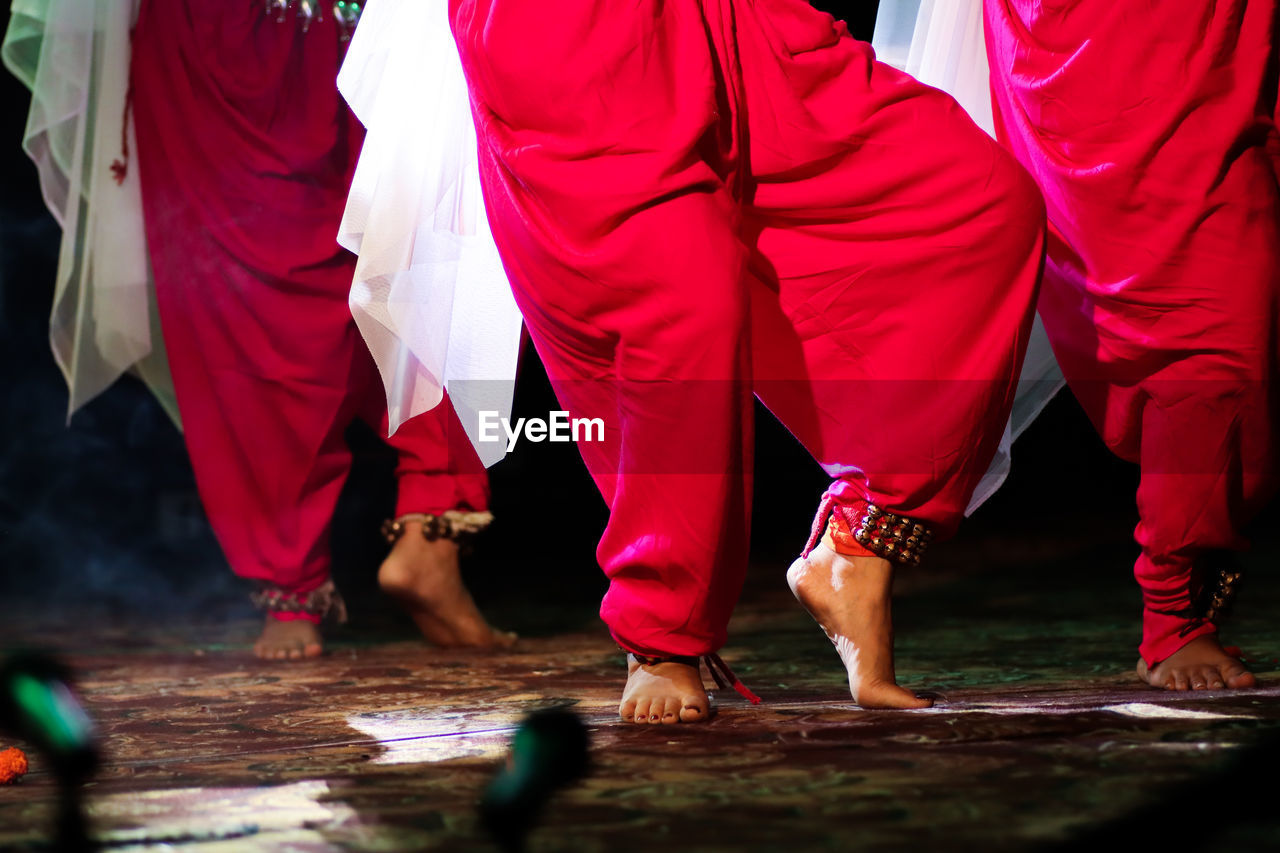 Low section of woman dancing on stage