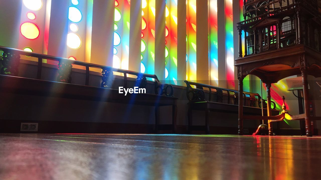 REFLECTION OF ILLUMINATED LIGHTS ON BUILDING