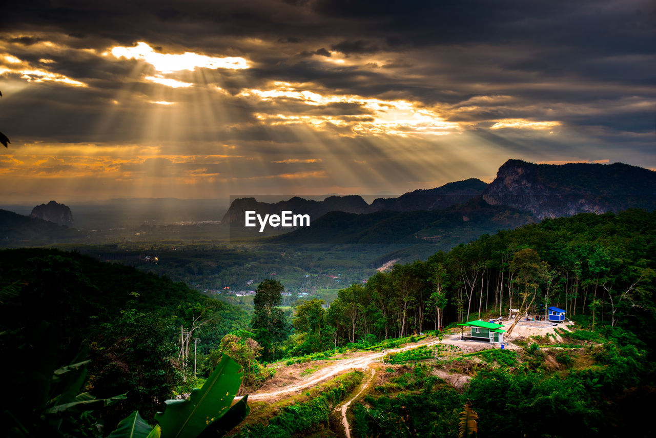 Scenic view of landscape against sky during sunset