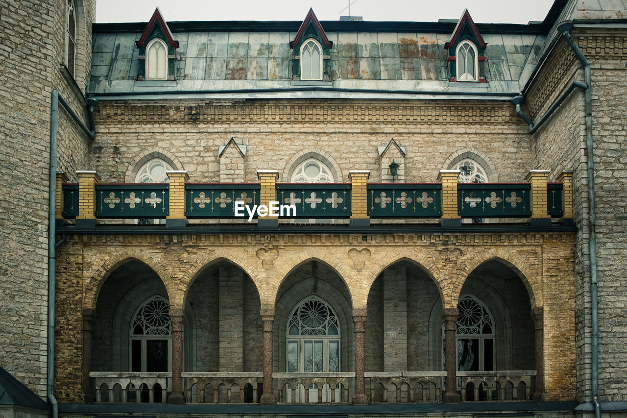 An old castle built in medieval style in the 19th century. it is not in the best shape.