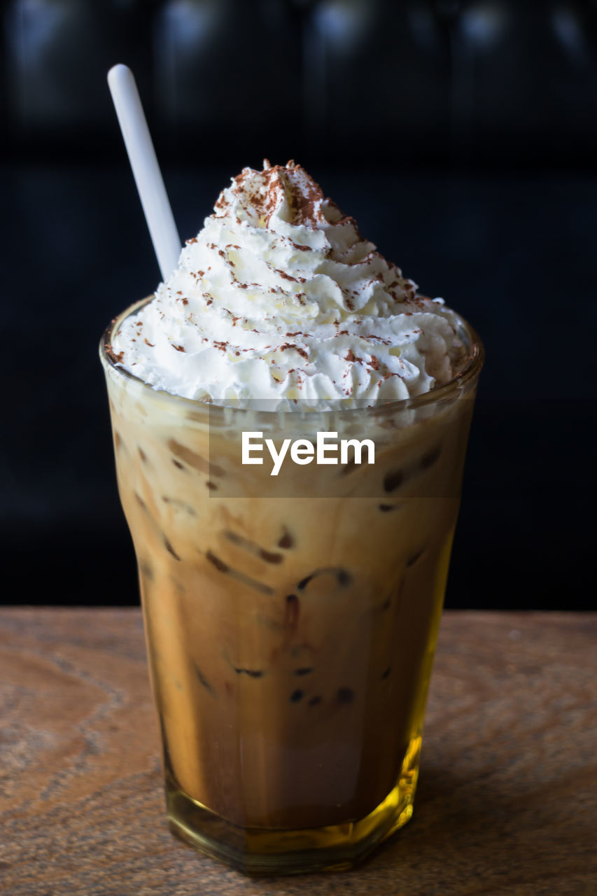 Close-up of ice cream drink on table