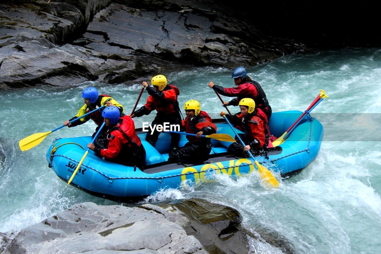 PEOPLE ENJOYING IN RIVER