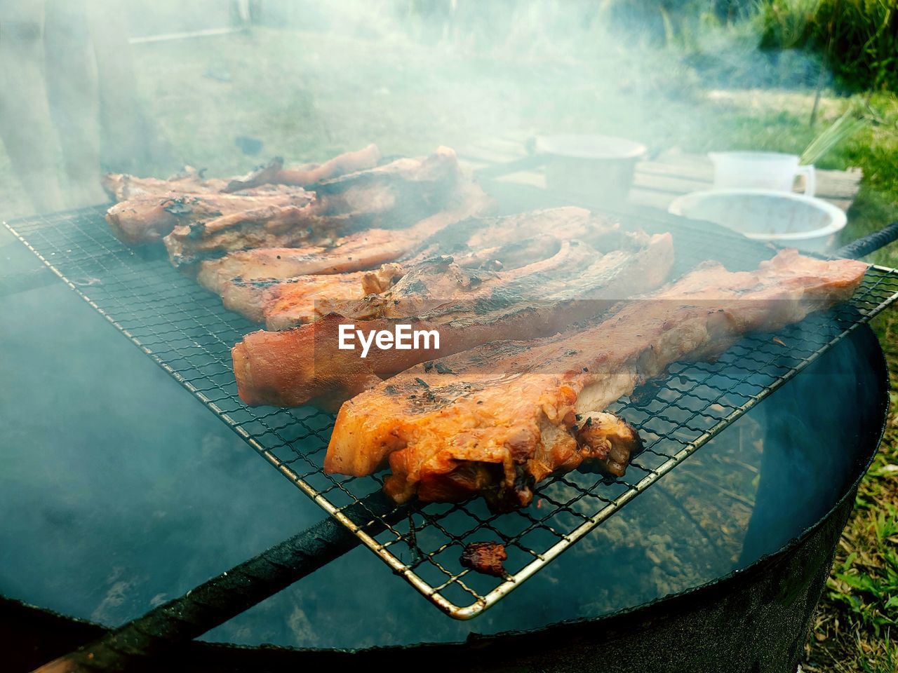 HIGH ANGLE VIEW OF MEAT ON BARBECUE