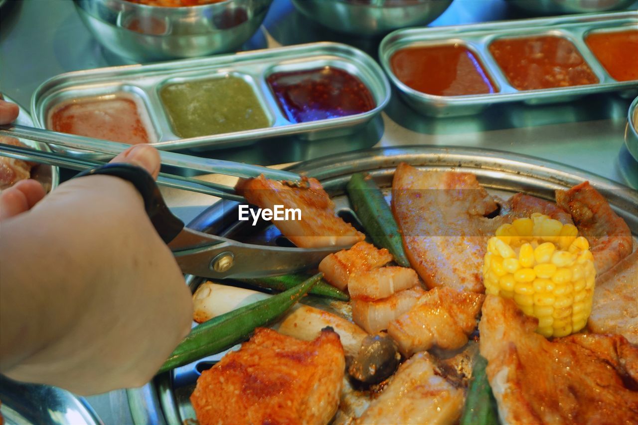 High angle view of person preparing food