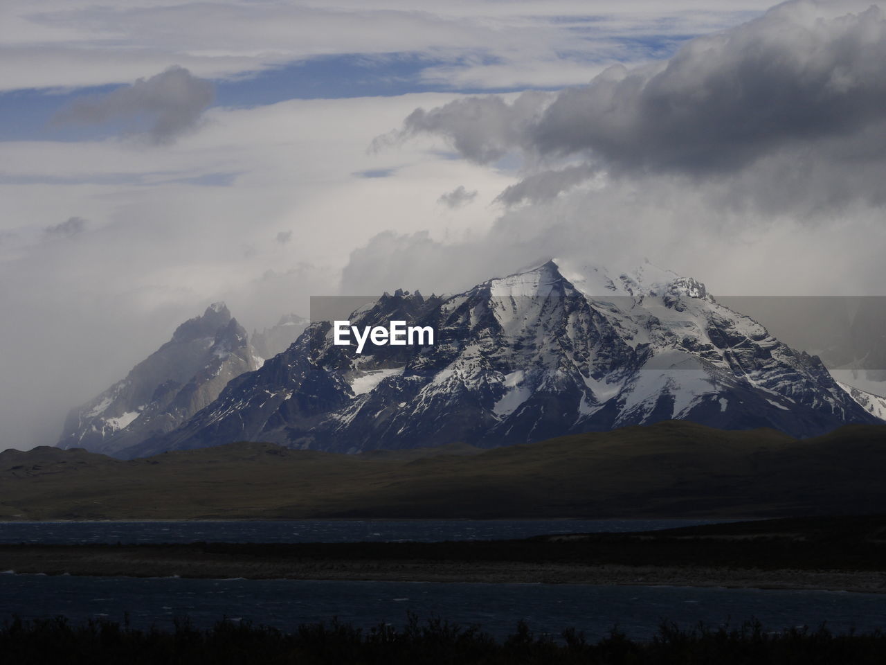 Scenic view of snowcapped mountains against sky, torres del paine, patagonia, chile 