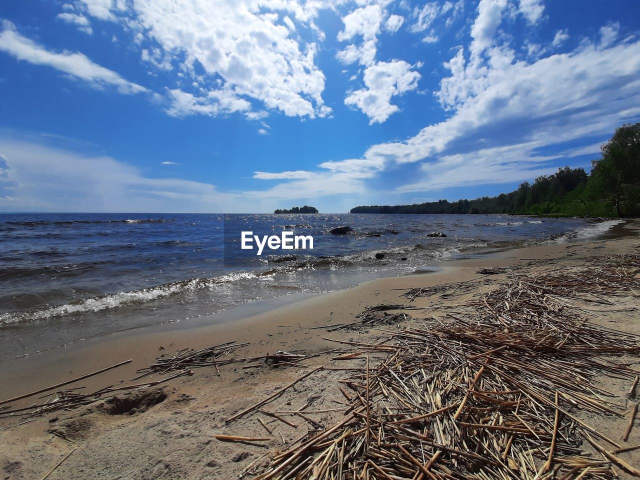 VIEW OF BEACH AGAINST SKY