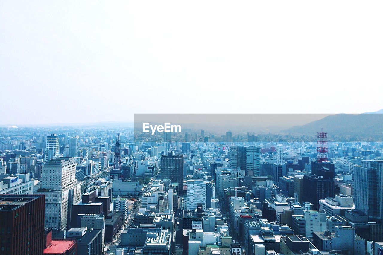 High angle view of cityscape against clear sky