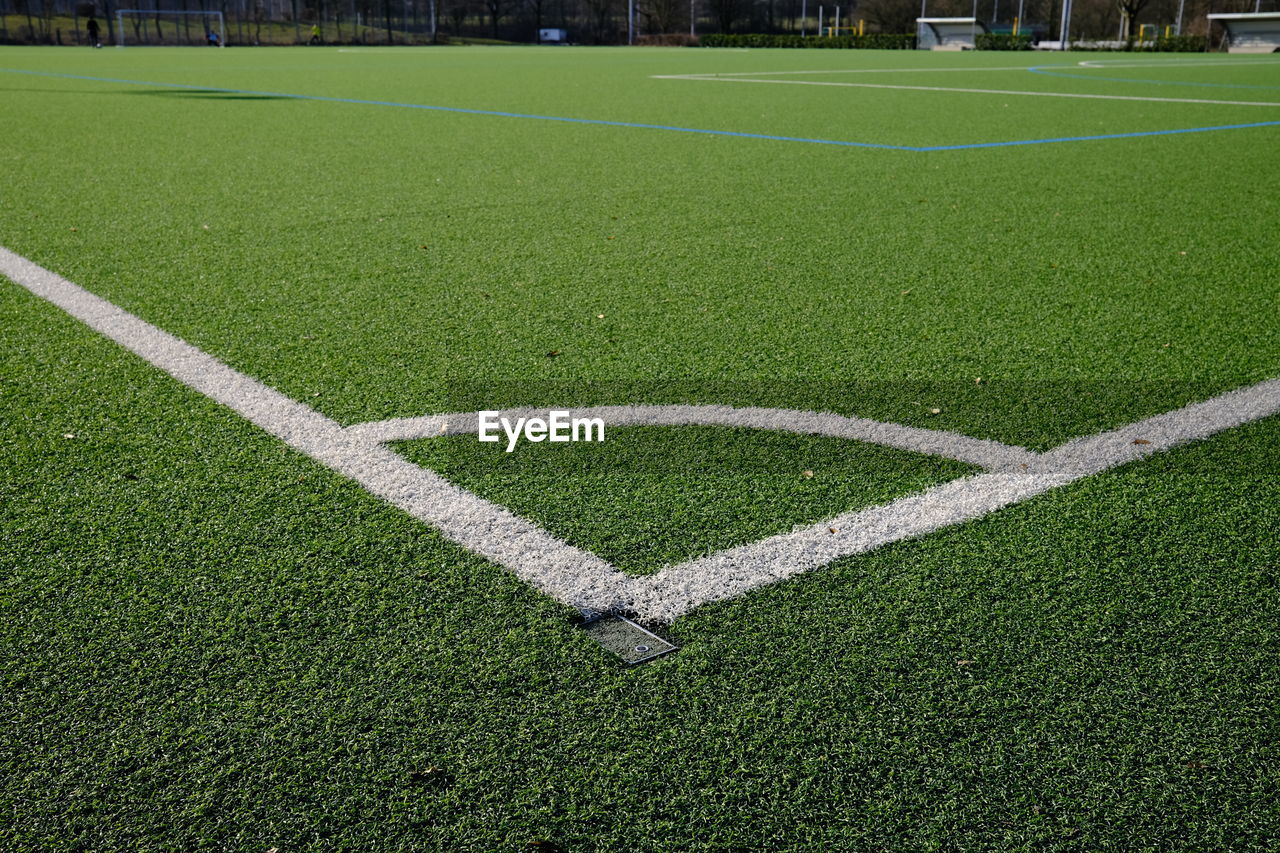 grass, flooring, sports, green, lawn, soccer-specific stadium, artificial turf, plant, sport venue, baseball field, soccer, stadium, playing field, soccer field, team sport, no people, net, nature, field, day, turf, outdoors, high angle view, white