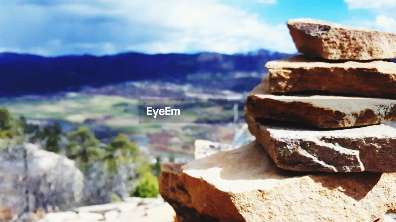 CLOSE-UP OF STACK OF ROCK