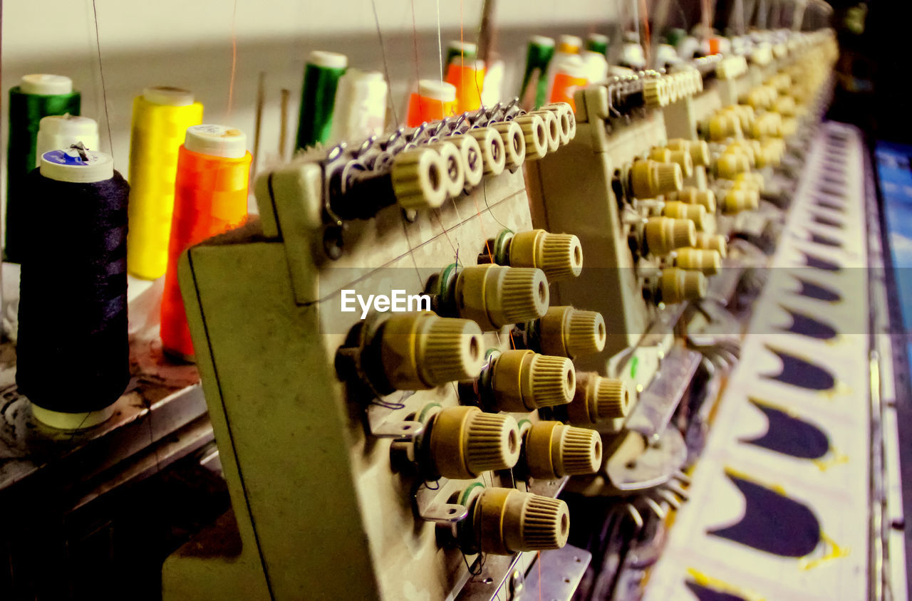 Close-up of machinery at textile industry
